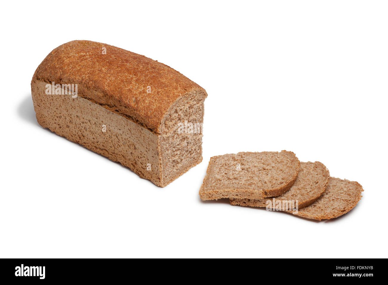 Loaf of spelt bread and slices on white background Stock Photo
