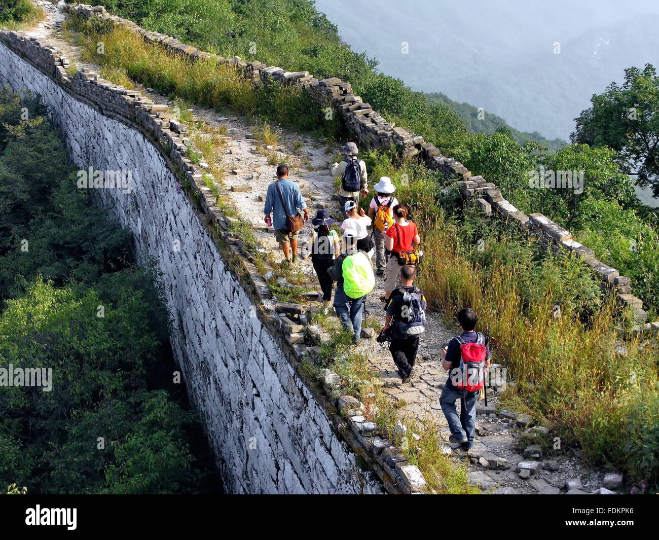 hikers on wild great wall in Beijing Stock Photo