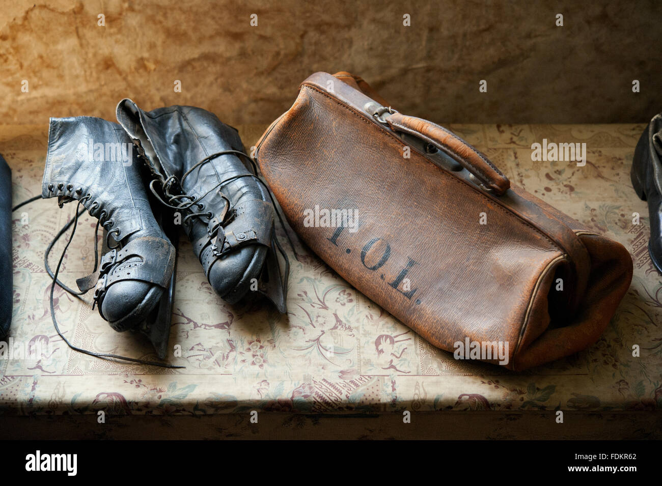Ice skates and a monogrammed leather bag in the Master Bedroom at