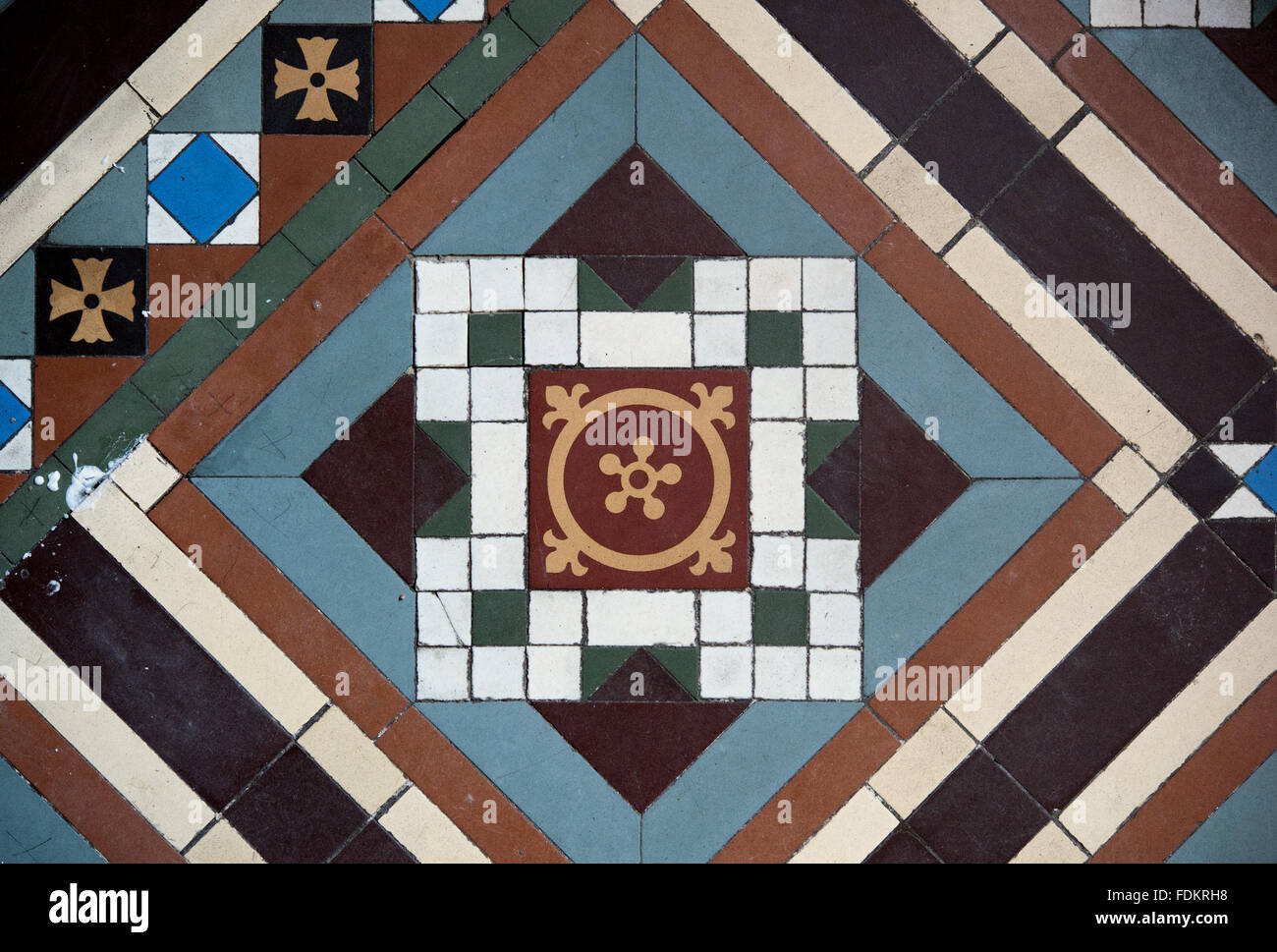 Close view of the Maw & Co tiled floor of the Entrance Hall at Sunnycroft, Shropshire. The tessellated tiled floor dates from 1899 and is a mixture of plain, vitreous and encaustic tiles. Stock Photo