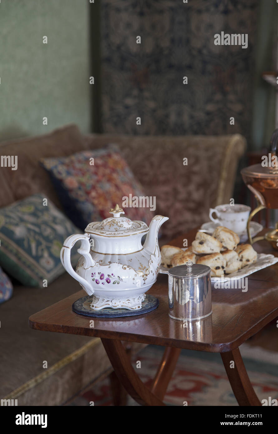 Table laid for afternoon tea in the Drawing Room at Standen, West Sussex Stock Photo Alamy