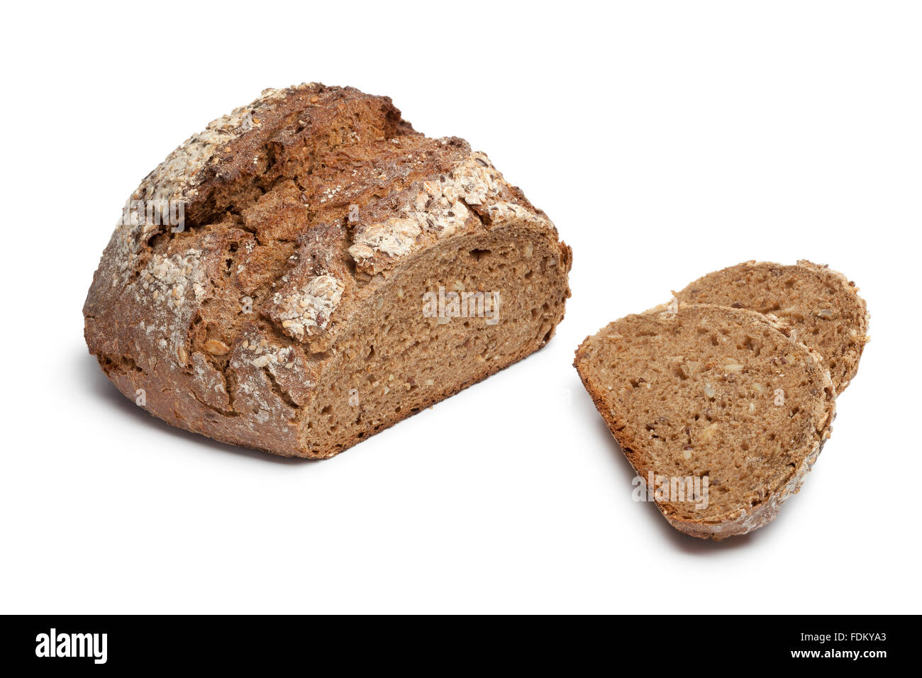 Multi grain farmers bread with slices on white background Stock Photo