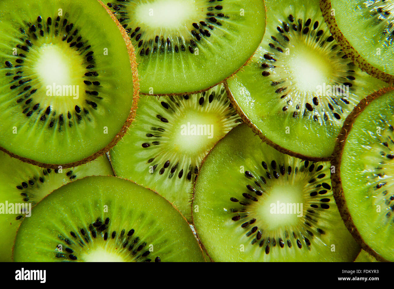 Background from sliced kiwi fruit Stock Photo - Alamy