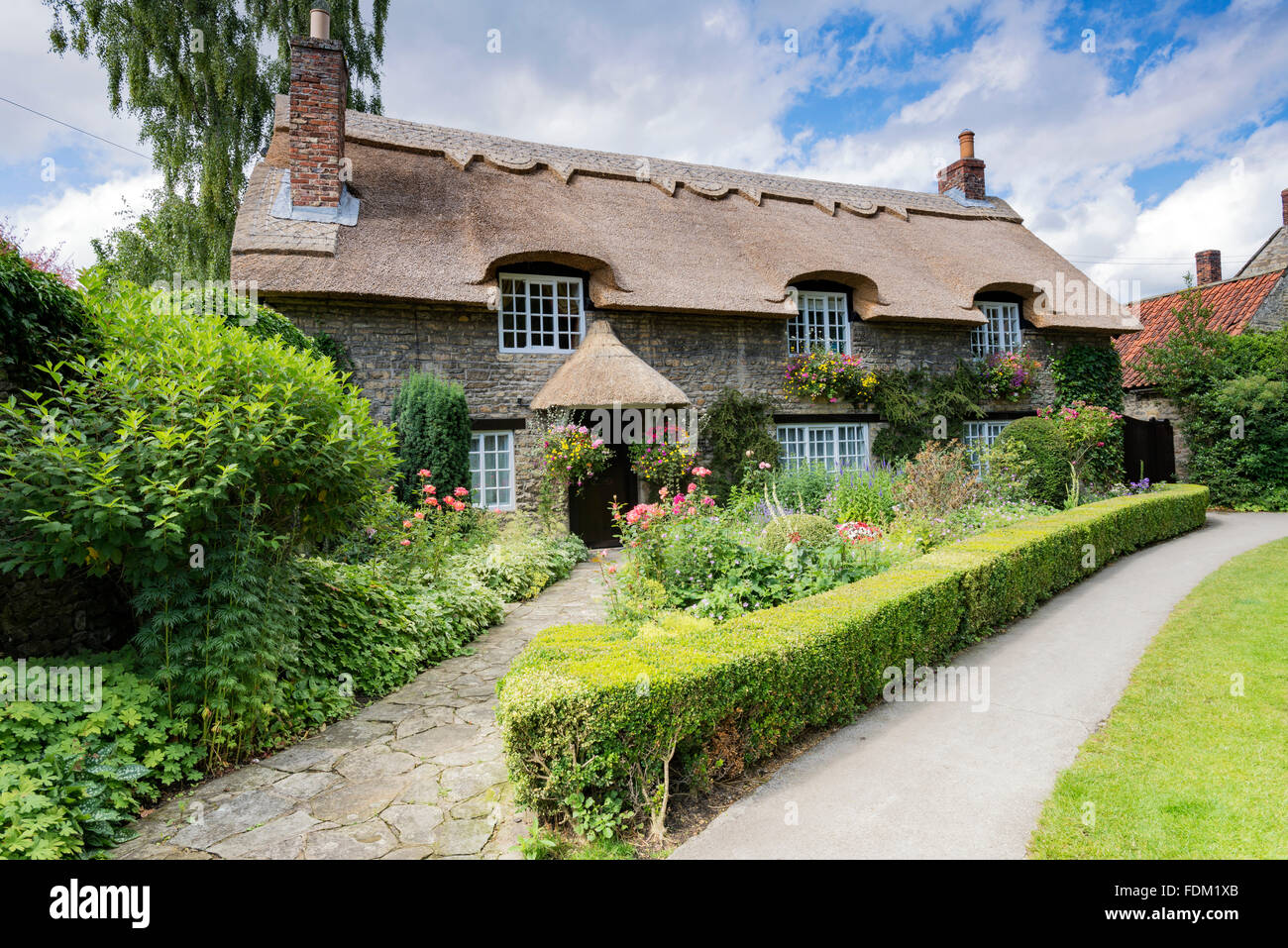 The famous thatched cottage at Thornton le Dale Stock Photo Alamy