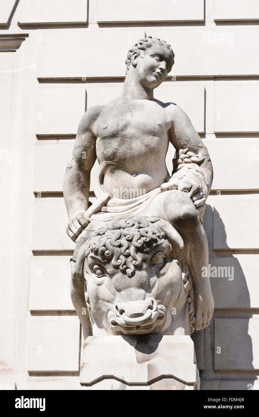 Decorative statue on the wall of Department of Energy and Climate Office building, London, United Kingdom. Stock Photo