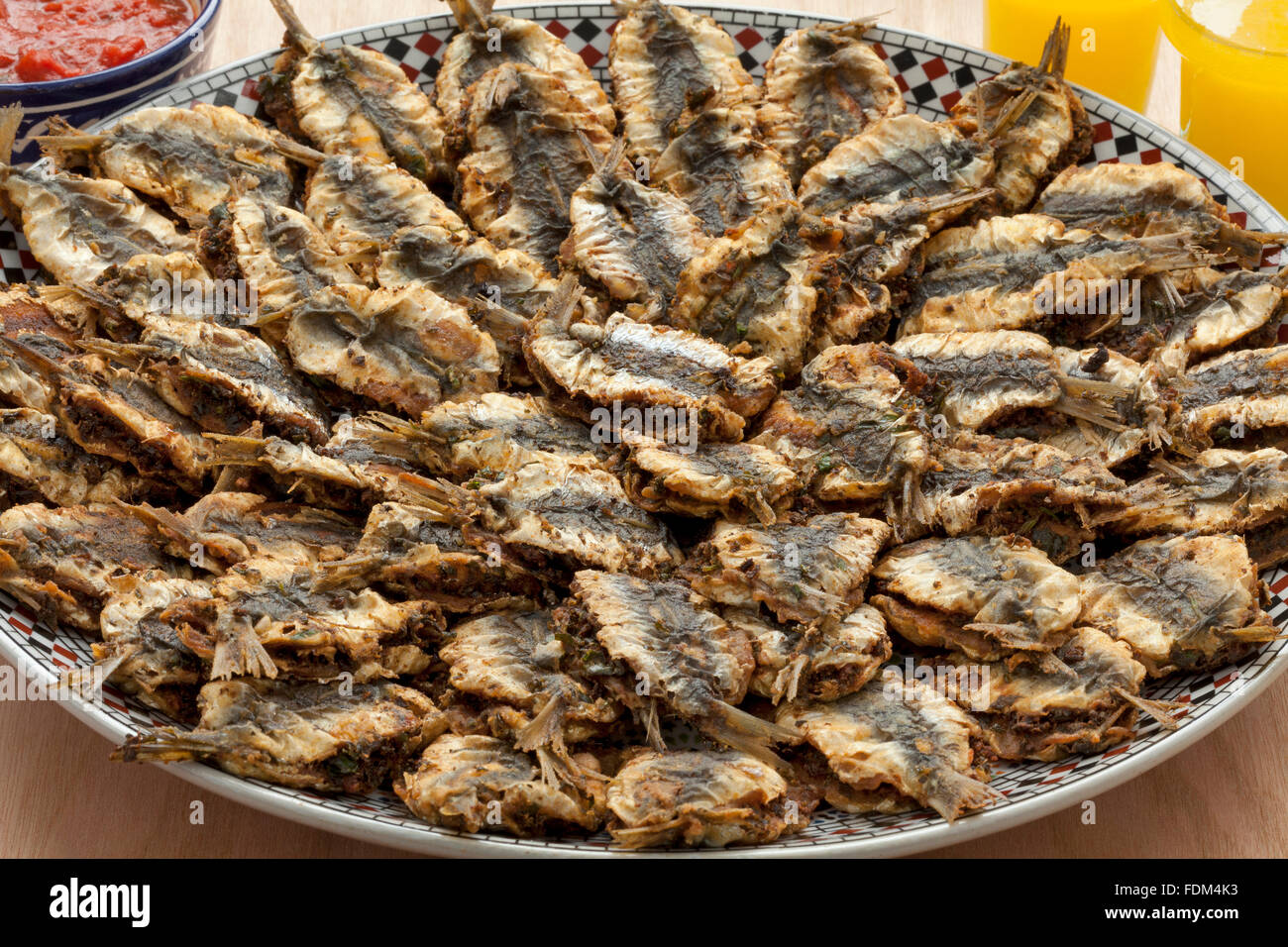 Dish with Moroccan fried stuffed sardines close up Stock Photo