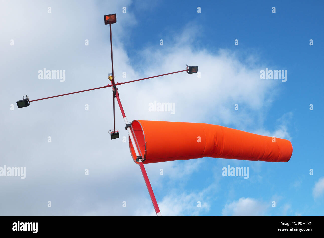 Illuminated windsock blowing in strong winds the lights allow night