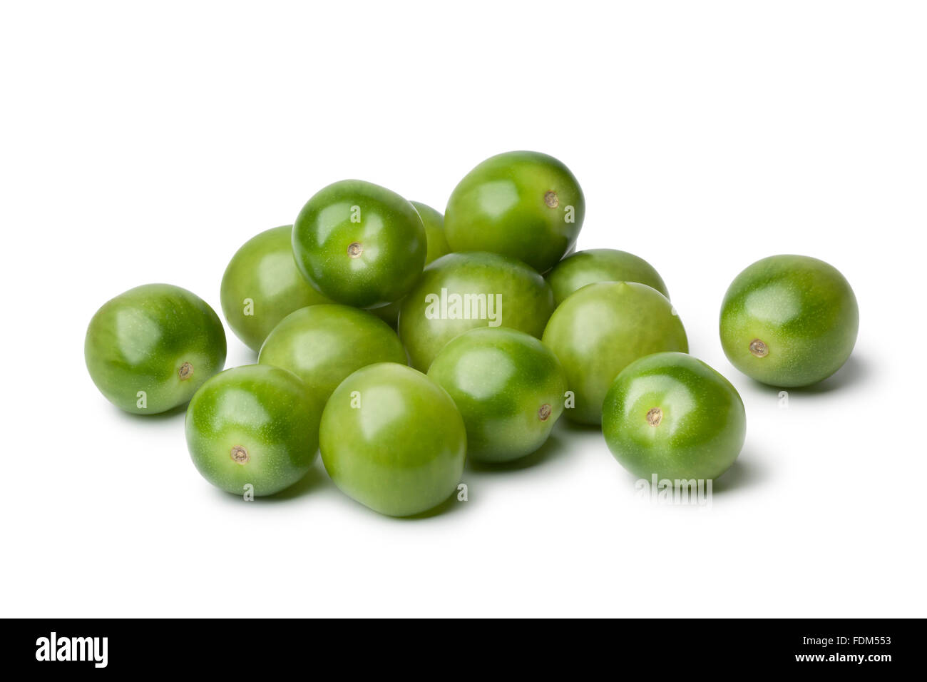 Fresh green tomatoes on white background Stock Photo