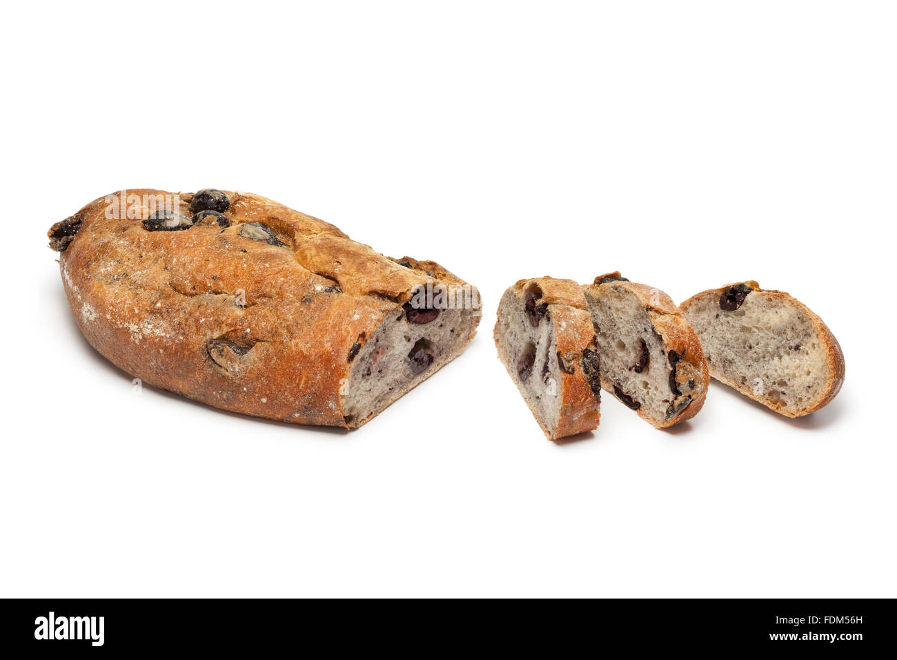 Fresh whole wheat black olive bread and slices on white background Stock Photo