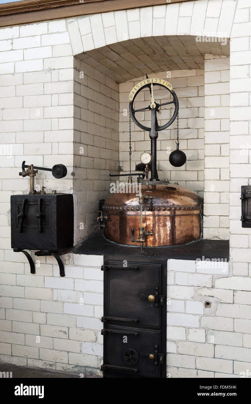 The late nineteenth century copper boiler in the Great Kitchen at Tredegar House, Newport, South Wales. Stock Photo