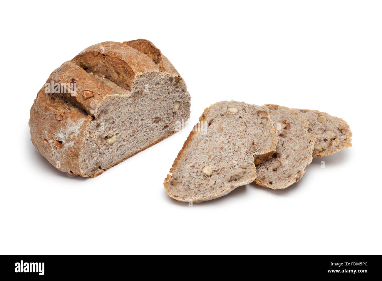 Fresh whole wheat nut bread and  slices on white background Stock Photo