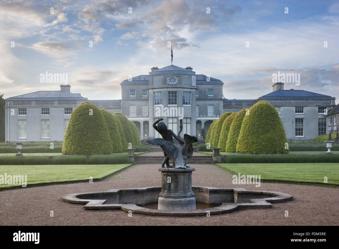 The west front on a misty dawn in June on the Shugborough Estate, Staffordshire. Stock Photo