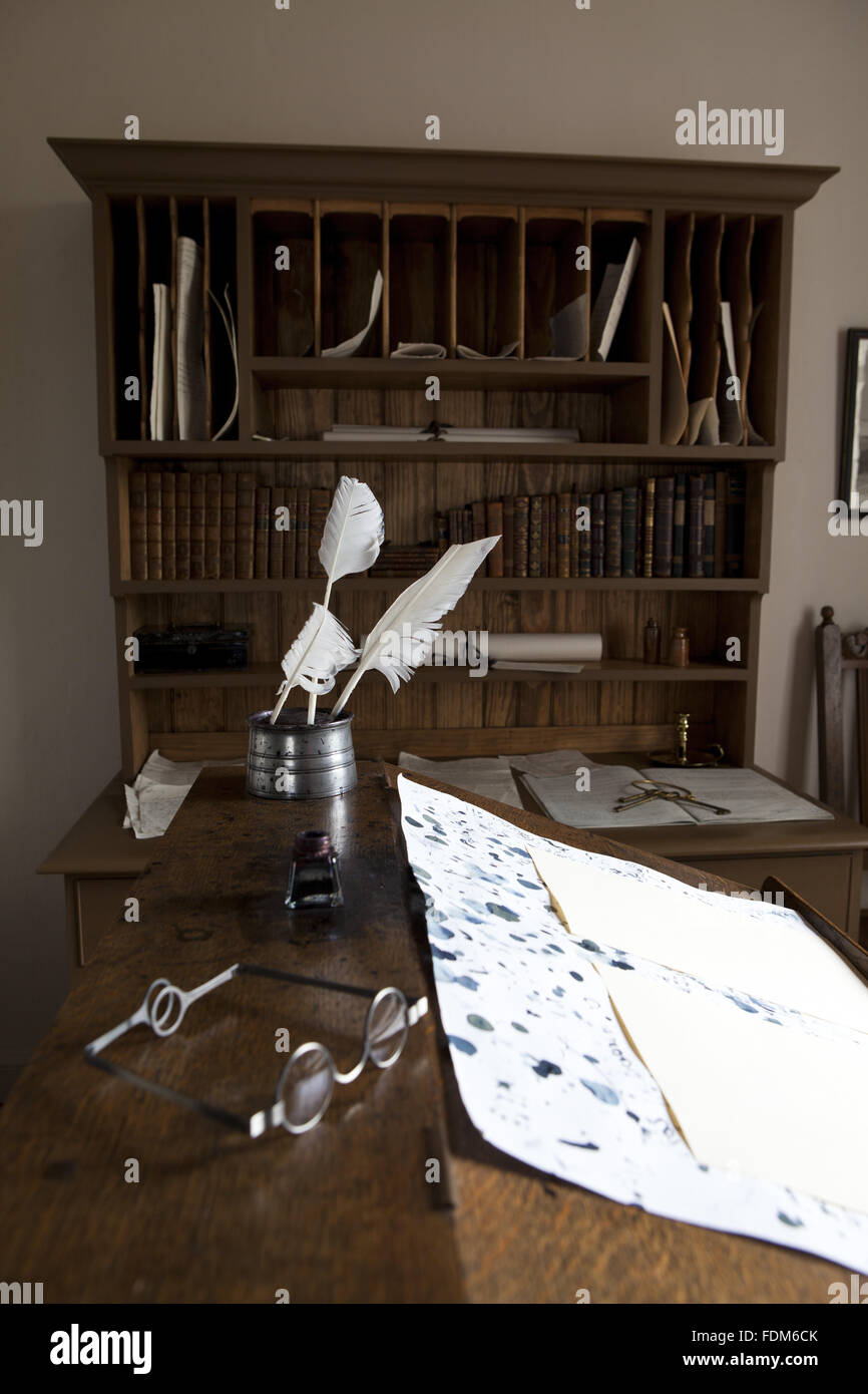 Quill pens and the desk in the Back Office at Wordsworth House, Cockermouth, Cumbria. Stock Photo