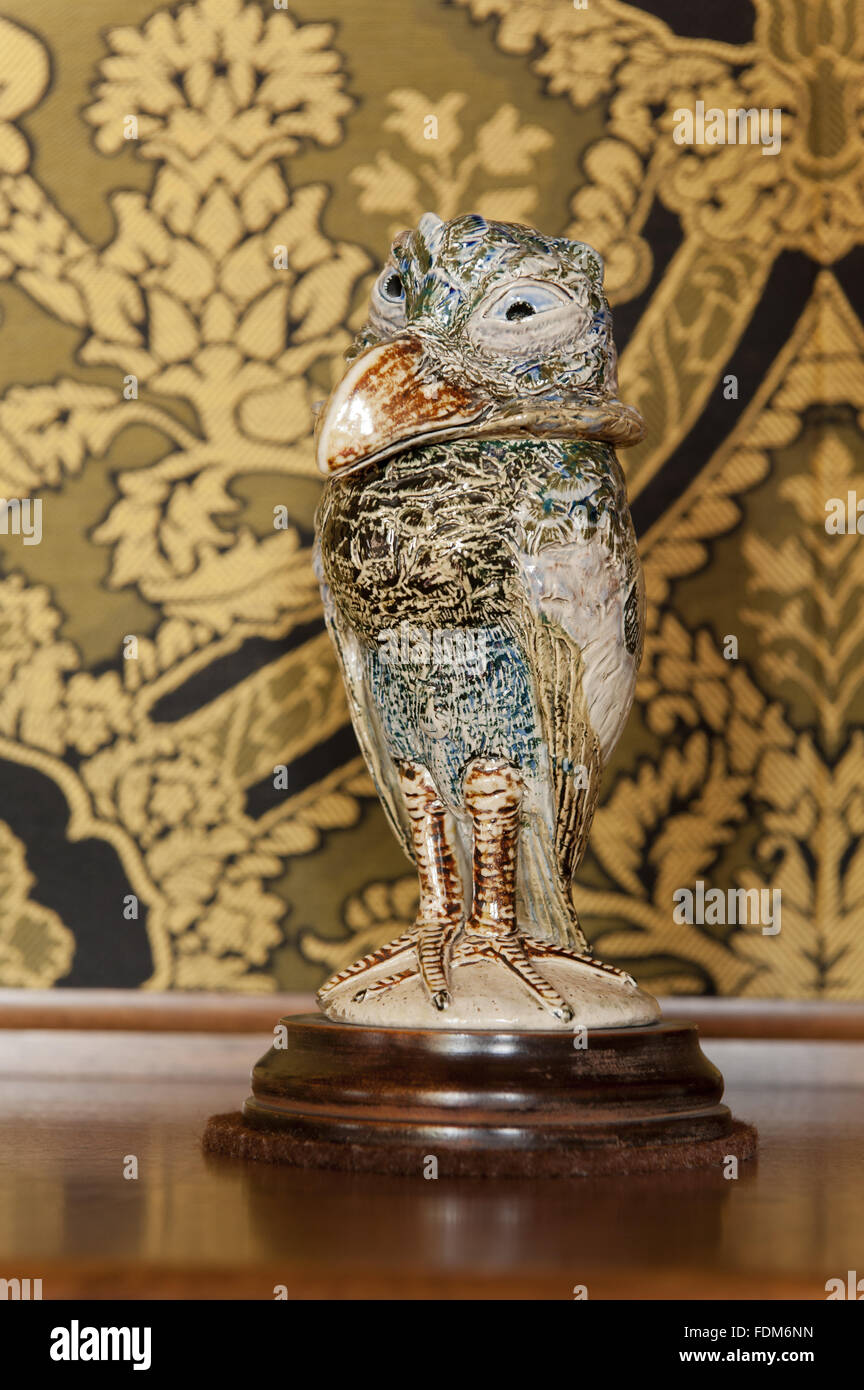 Martin brothers grotesque bird vessel in the Library at Knightshayes Court, Devon. NT inventory: 540421. Stock Photo