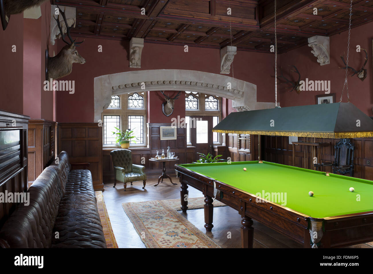 The Billiard Room at Knightshayes Court, Devon. The billiard table was built by Thurston's of London and is original to the house. Stock Photo