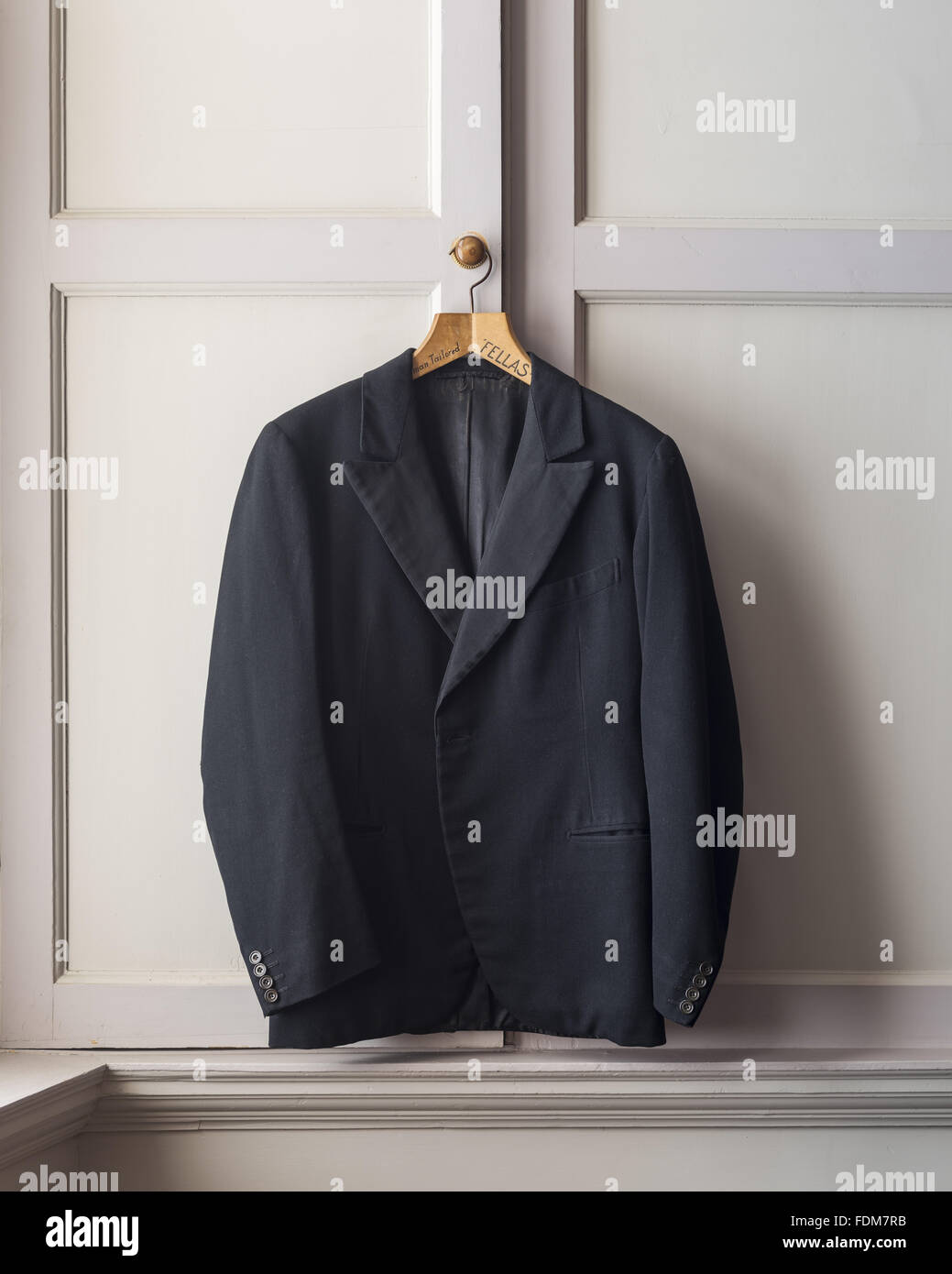 Jacket on a hanger in the Wisteria Bedroom at Dunster Castle, Somerset. Stock Photo