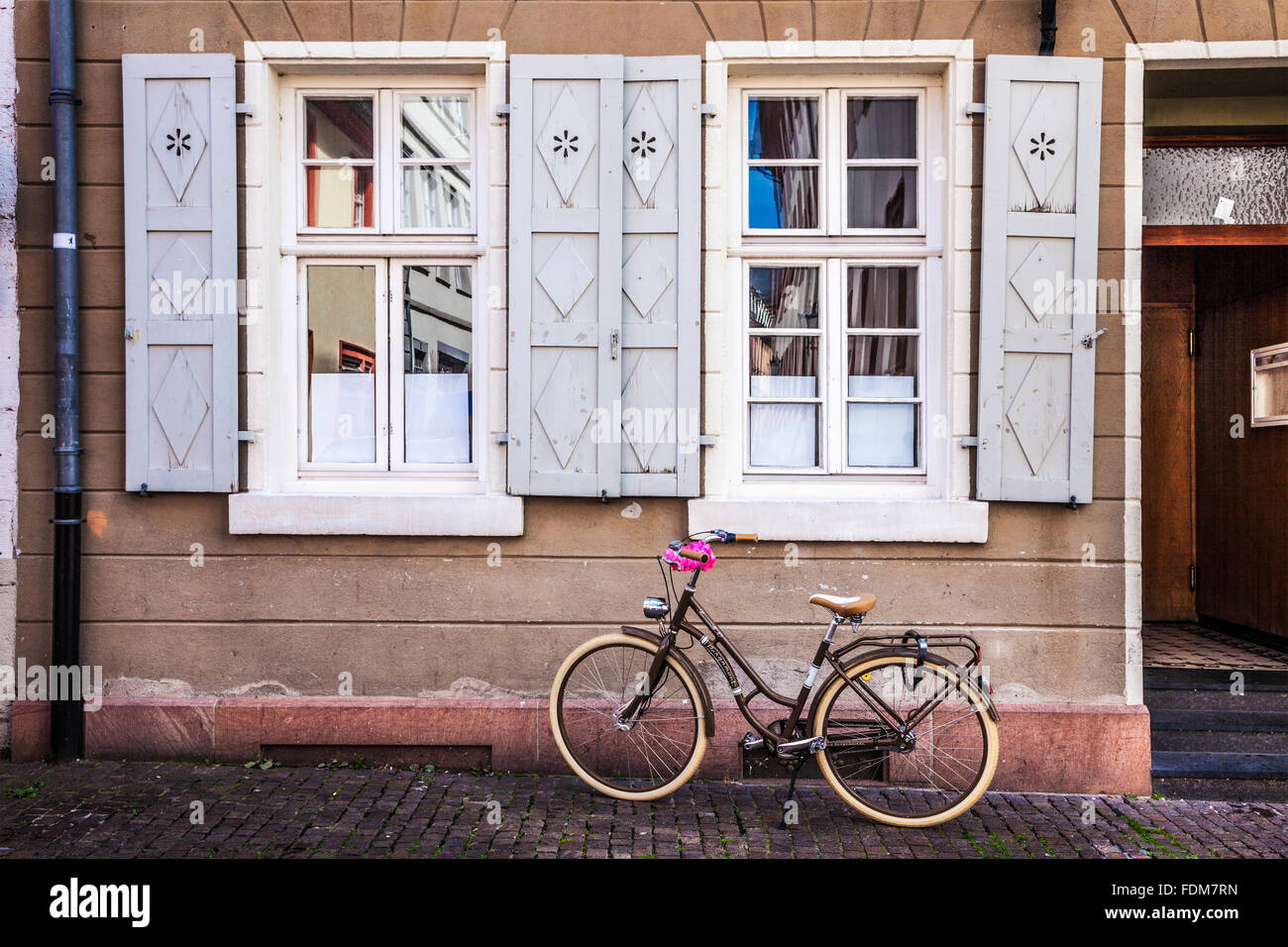 Student bicycle in Ingrimstrasse in the University town of Heidelberg. Stock Photo