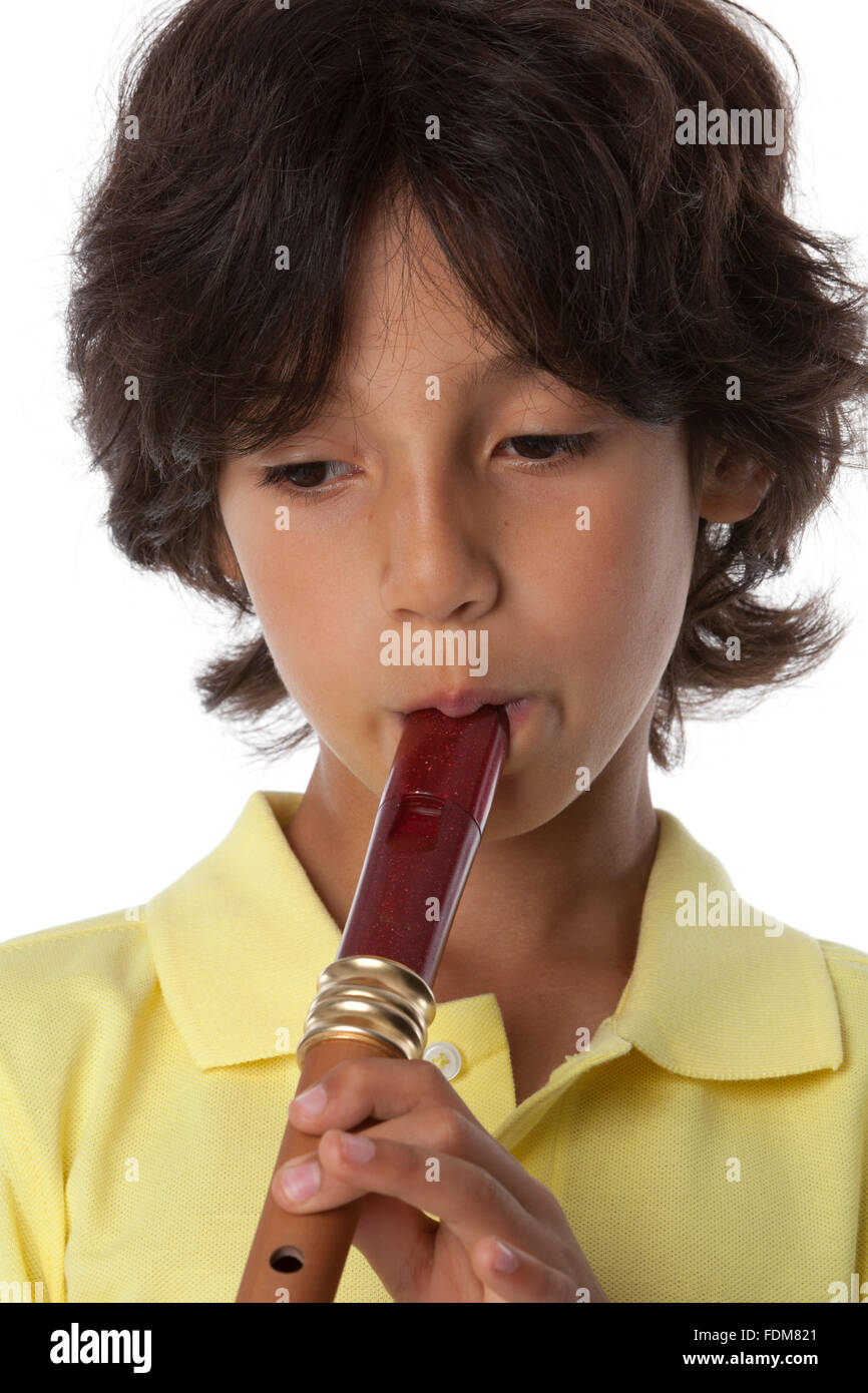 Little boy is playing the recorder on white background Stock Photo Alamy