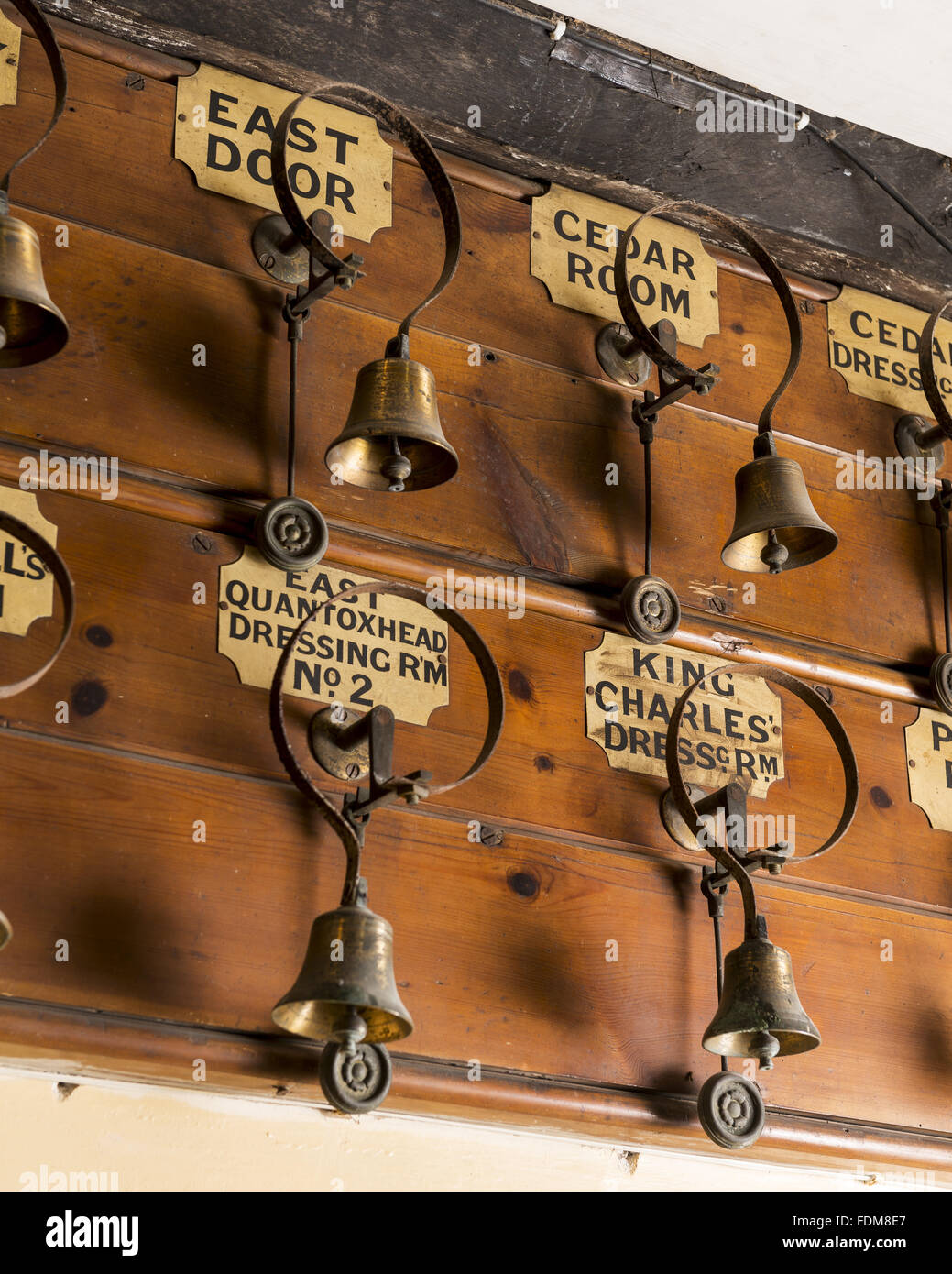 Servants' bells in the Bell Chamber at Dunster Castle, Somerset. Stock Photo