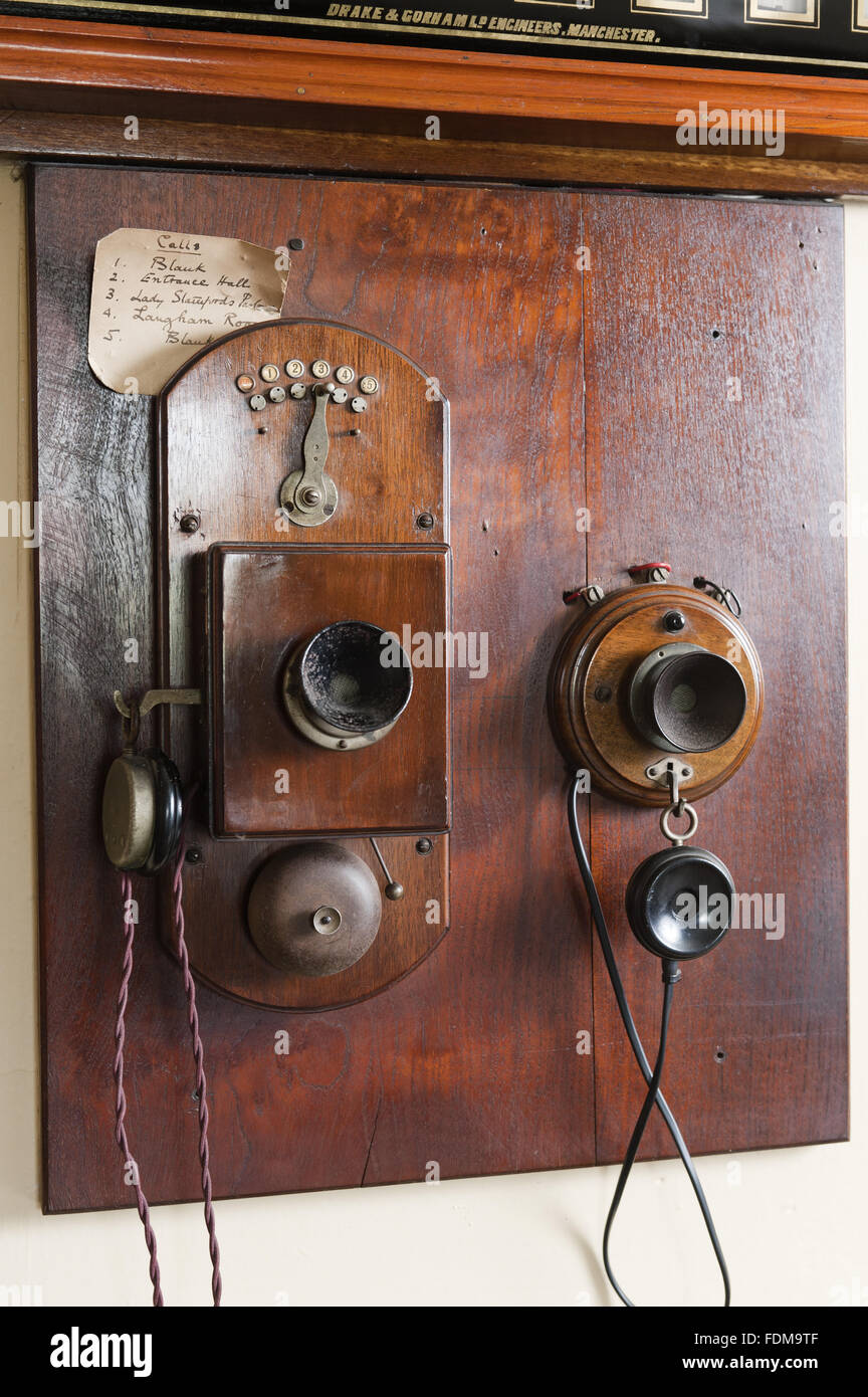 Servants communication system in the Butler's Pantry at Dunham Massey, Cheshire. The butler would have used the internal telephone system  to communicate with the rest of the house and the gate lodge. Stock Photo