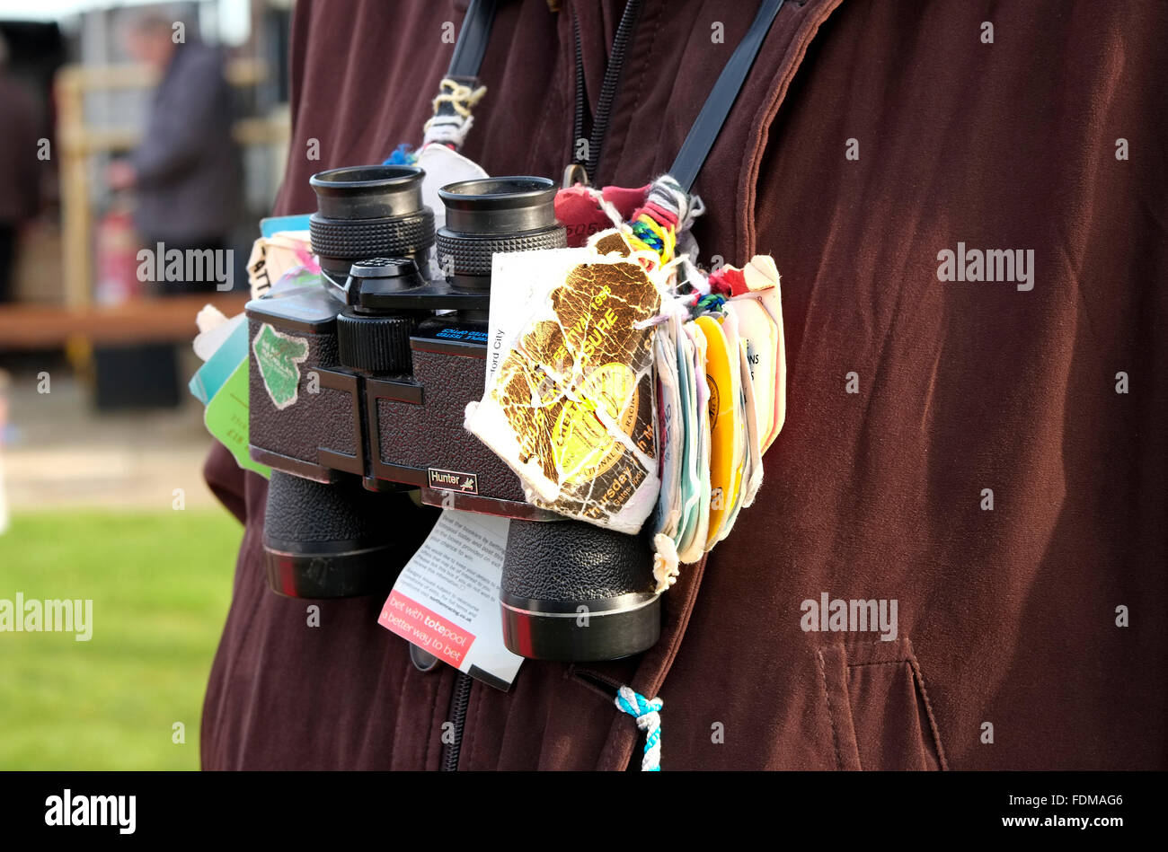 horse racing binoculars with tied course tags Stock Photo