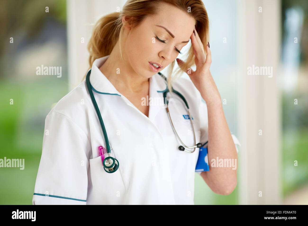 Tired nurse Stock Photo Alamy