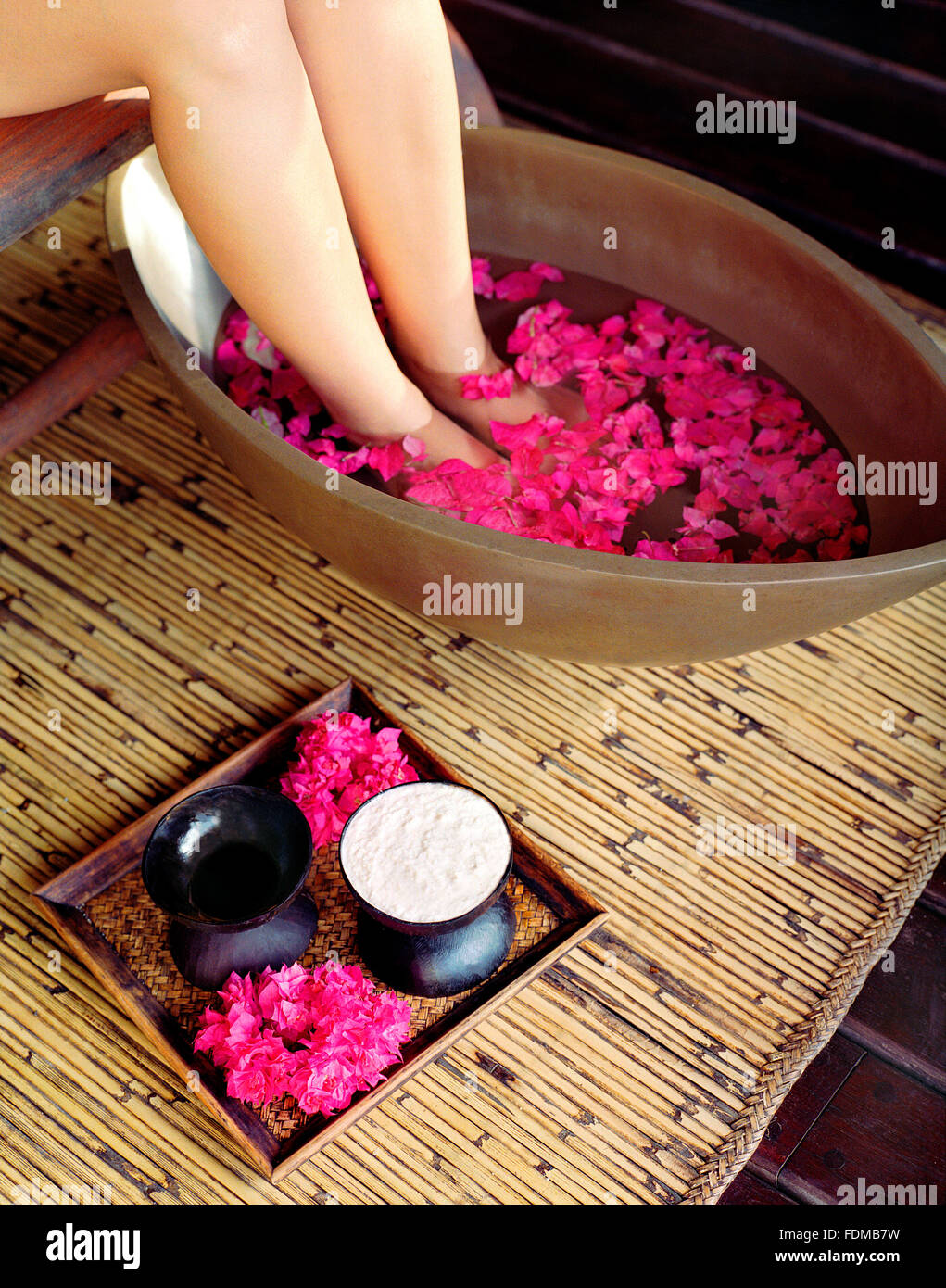 A woman gets a foot bath at the spa at The Farm at San Benito. Lipa