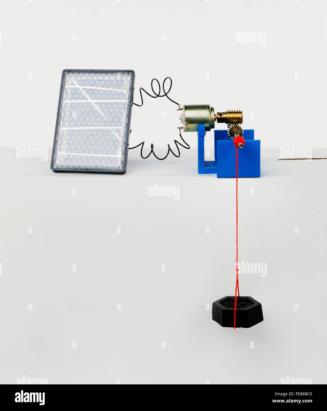 Solar panel generating power to motor enough to lift 1kg weight Stock