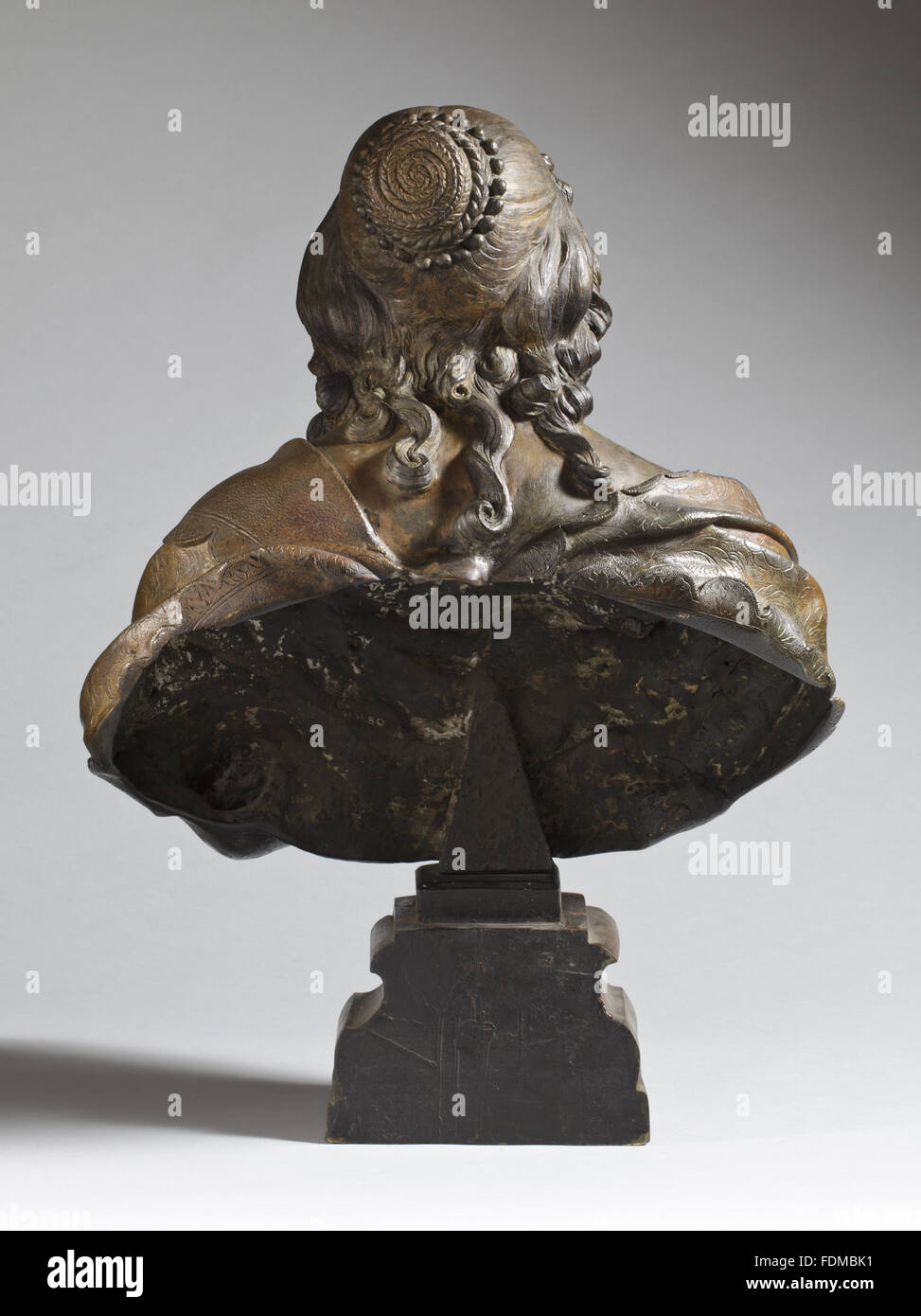 The reverse of a gilt bronze bust of Katherine Bruce, Mrs Murray, d.1649, by Hubert Le Sueur (c.1580 - London 1670), 1635, mounted on a scroll-shaped socle cast with the Bruce crest, a tree issuing from an earl's coronet, at Ham House, Surrey. Stock Photo