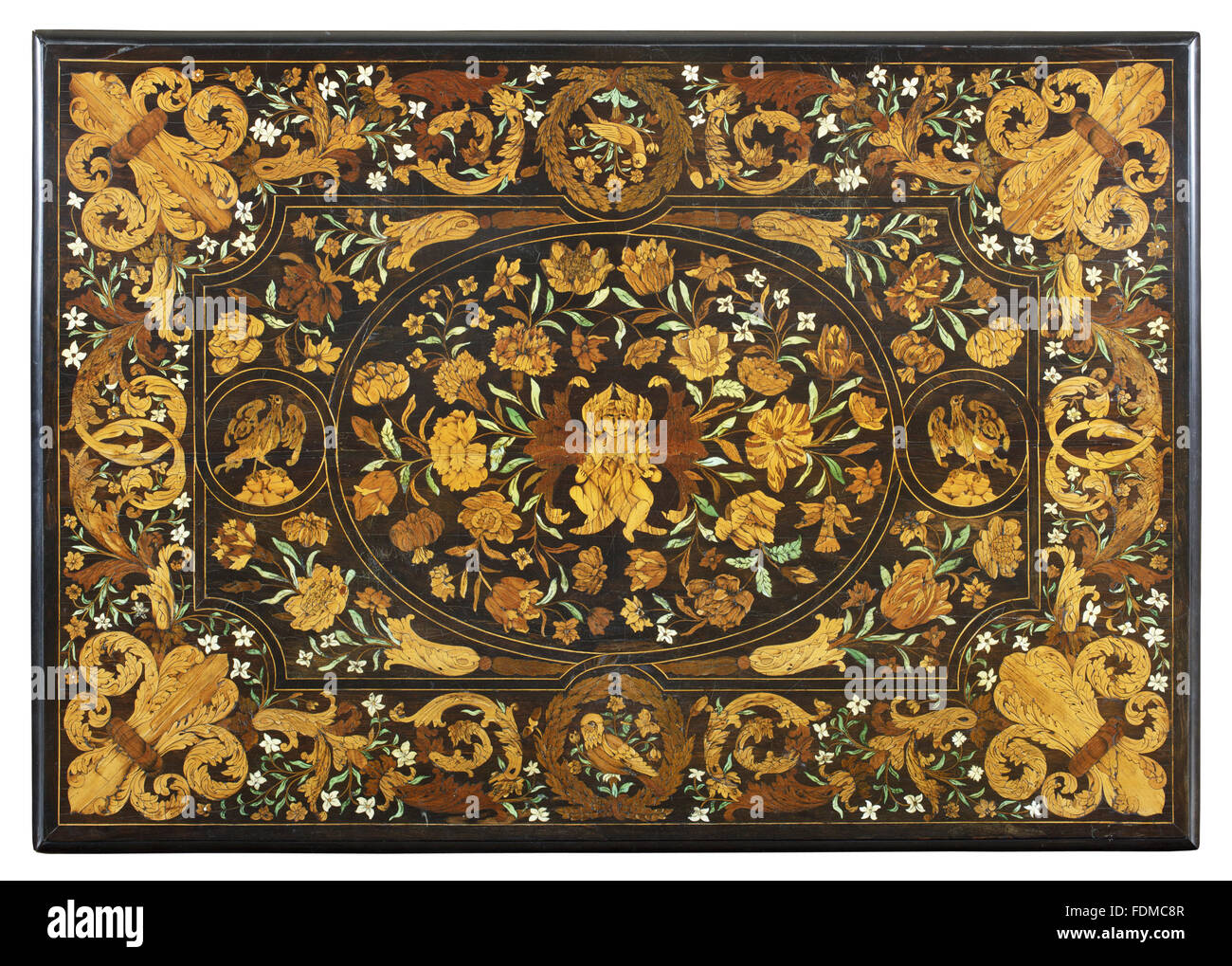 The marquetry table top of a table of 1675 decorated with floral marquetry in various woods and ivory, some stained green, at Ham House, Surrey. National Trust Inventory Number: 1139568. Stock Photo
