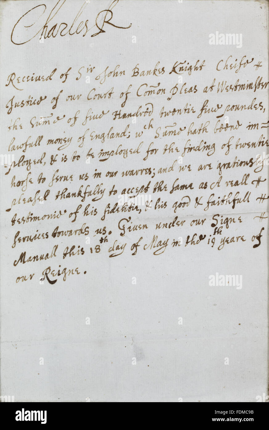 A handwritten receipt acknowledging a loan of five hundred guineas from Sir John Bankes to Charless II, kept in a cabinet in the Saloon at Kingston Lacy, Dorset. Stock Photo