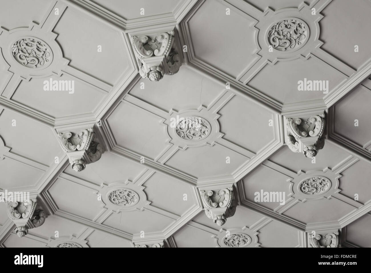 Detail of part of the plaster ceiling in the Dining Room at Gawthorpe Hall, Lancashire. The ceiling was remade by Sir Charles Barry in 1852 in an enriched form from the original design of 1605. Stock Photo