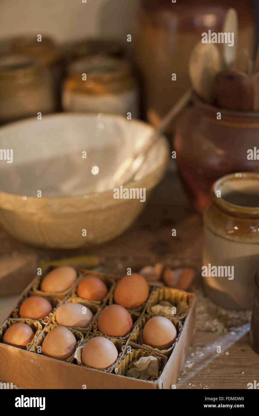 Eggs and baking equipment in the Kitchen at Avebury Manor, Wiltshire. Stock Photo