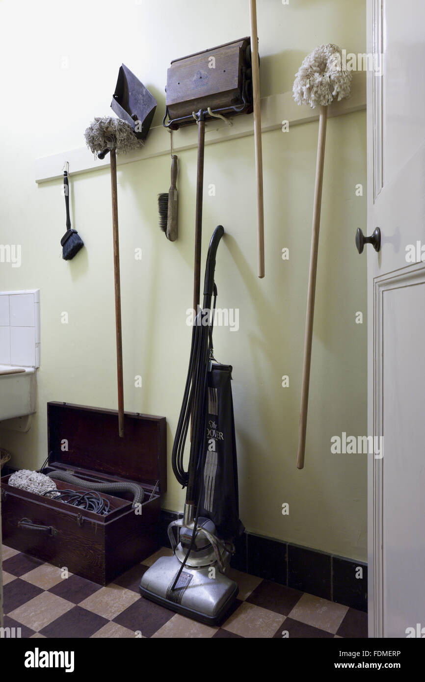 Vacuum cleaner and household cleaning equipment in the Sluice Room at Coleton Fishacre, Devon. Stock Photo