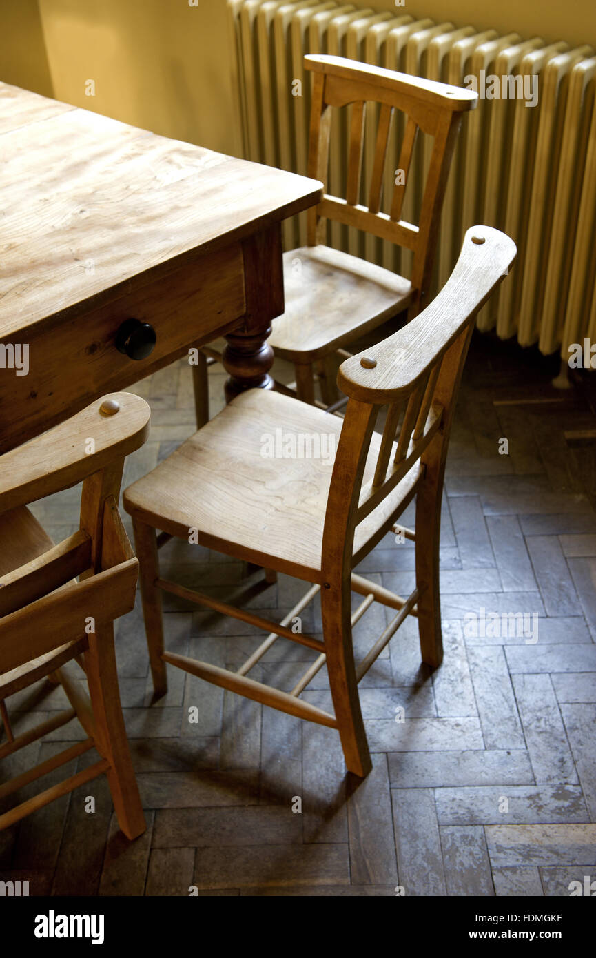 Dining table and chairs at Nanceglos House, a National Trust holiday