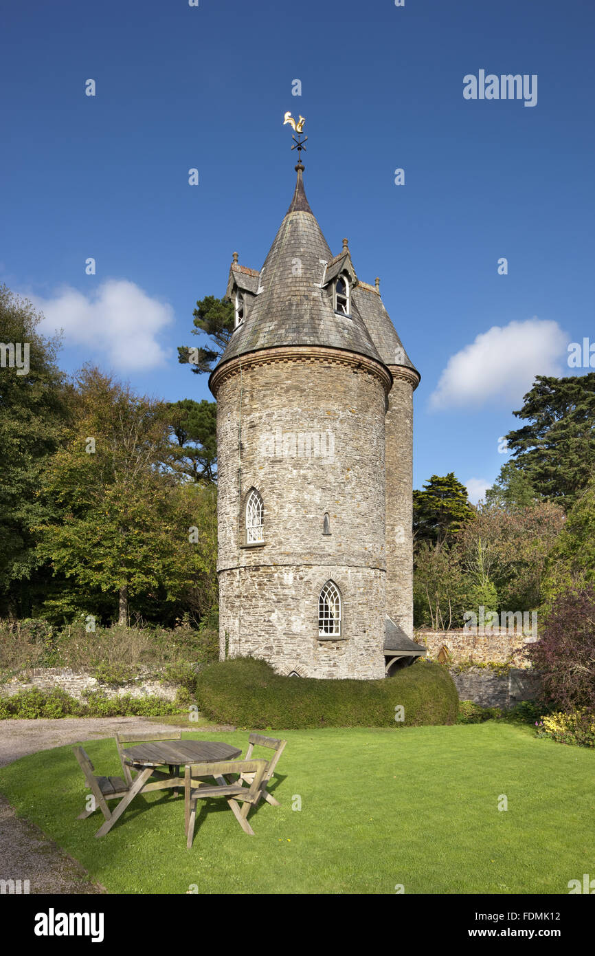 The Water Tower at Trelissick Garden, Cornwall. The building was put up, probably in the 1820s, to provide water pressure for the house and garden. It is now a National Trust holiday cottage. Stock Photo