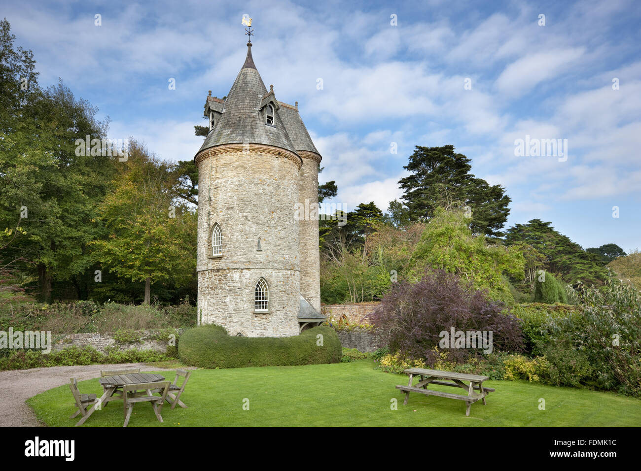 The Water Tower at Trelissick Garden, Cornwall. The building was put up, probably in the 1820s, to provide water pressure for the house and garden. It is now a National Trust holiday cottage. Stock Photo