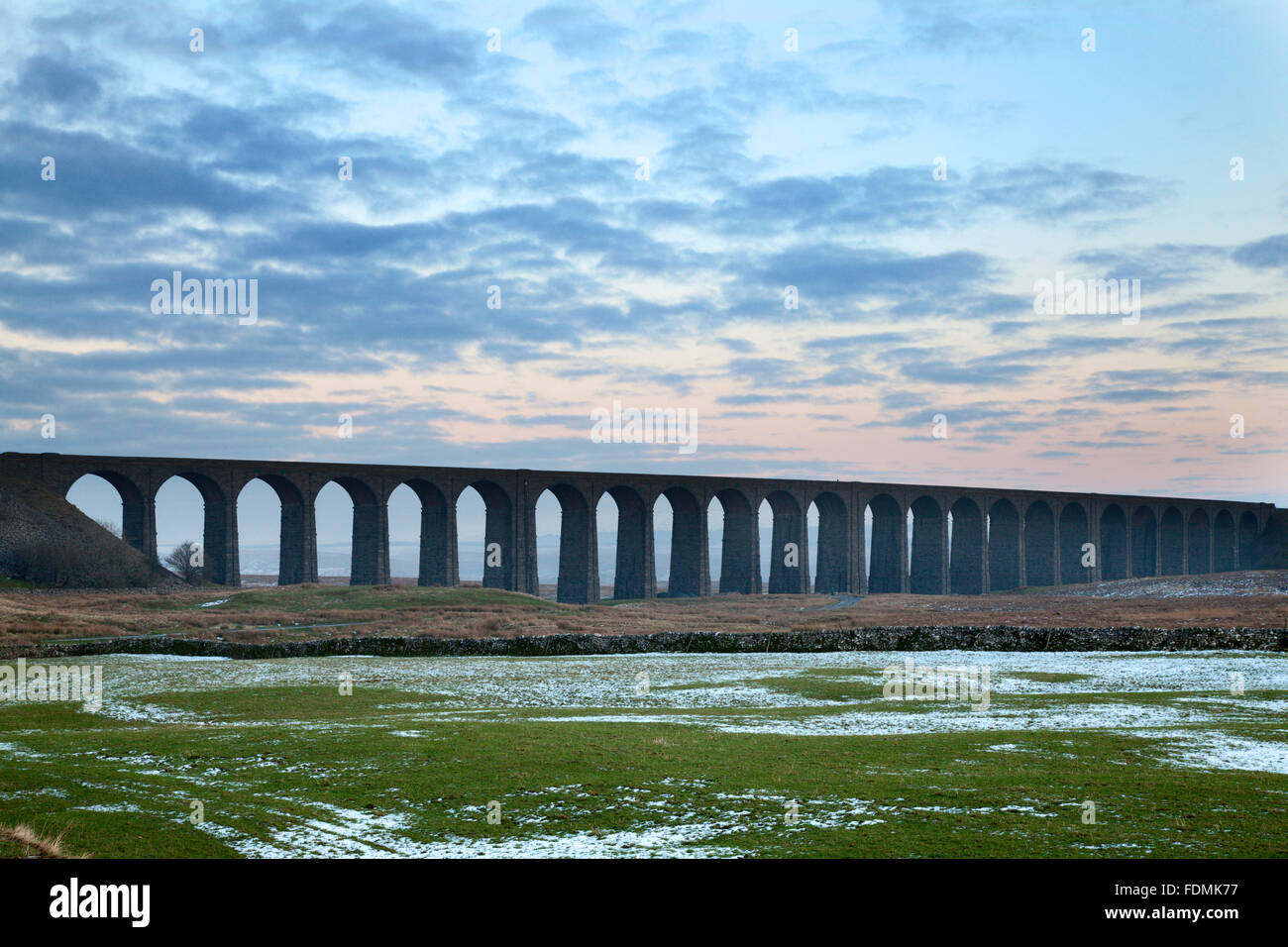 The Ribblehead Viaduct at Dusk in Winter Ribblehead Yorkshire Dales England Stock Photo