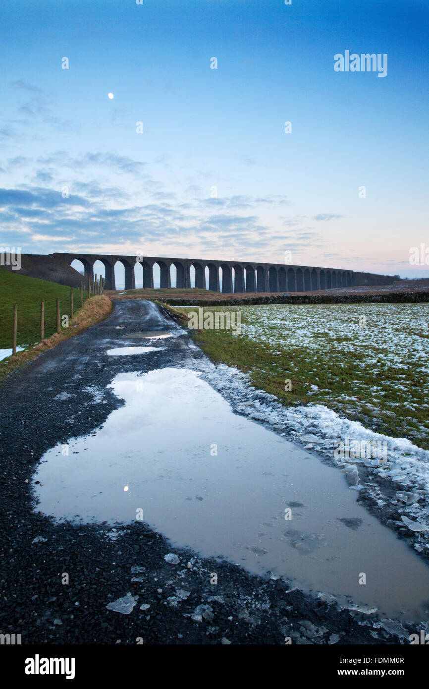 The Ribblehead Viaduct at Dusk in Winter Ribblehead Yorkshire Dales England Stock Photo