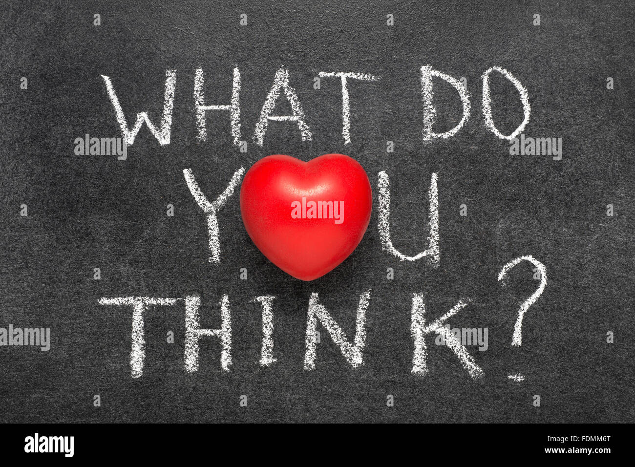 what do you think question handwritten on blackboard with heart symbol
