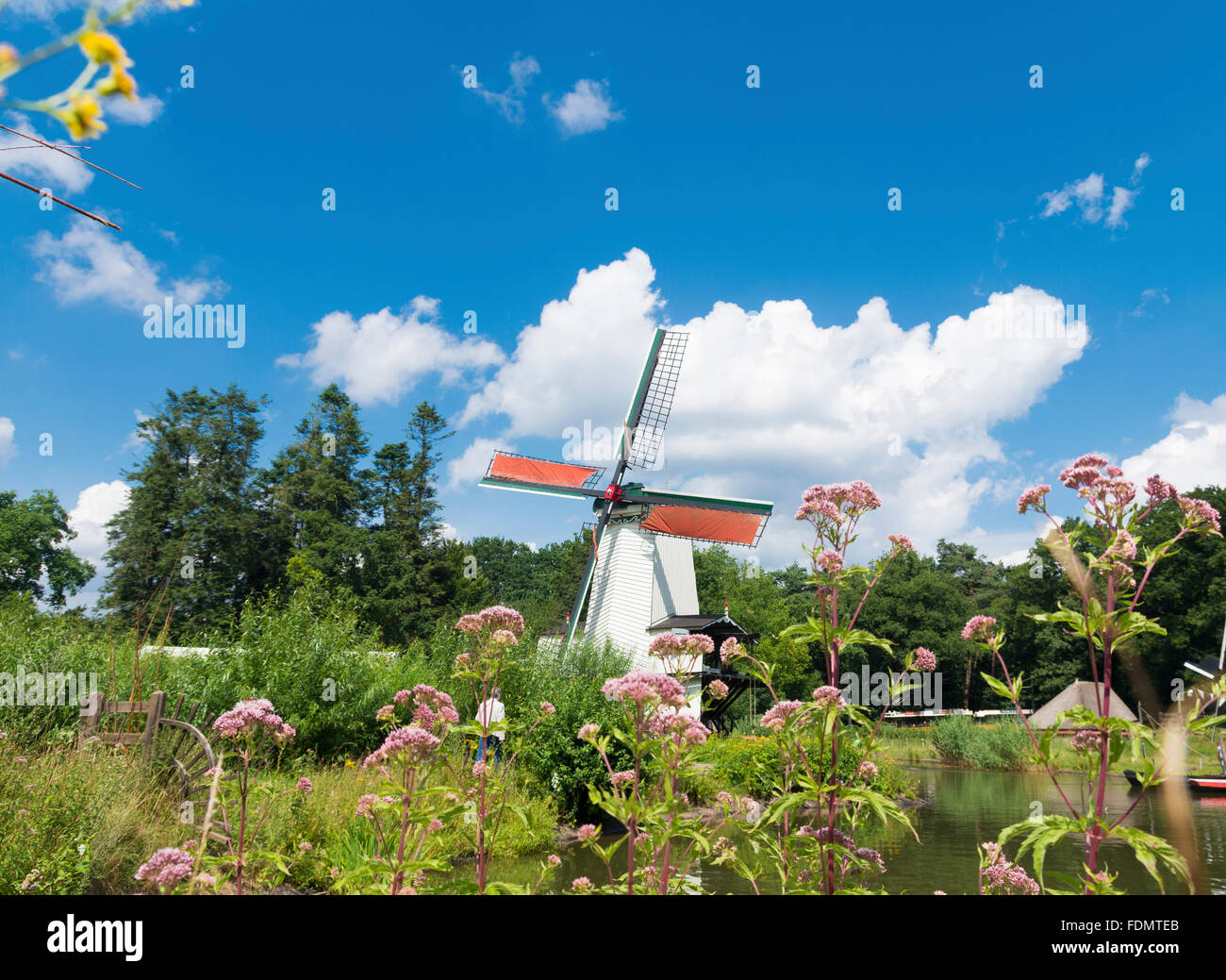traditional dutch windmill in a rural surrounding Stock Photo