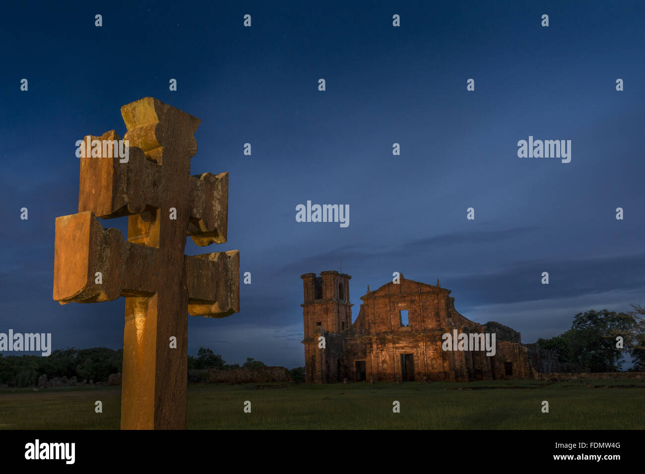 Night view of the missionary cross and church ruins in the Archaeological Site of St. Michael the Archangel Stock Photo