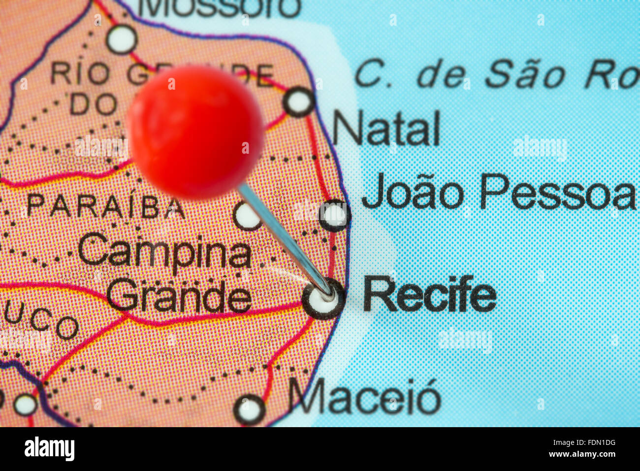 Close-up of a red pushpin in a map of Recife, Brazil. Stock Photo