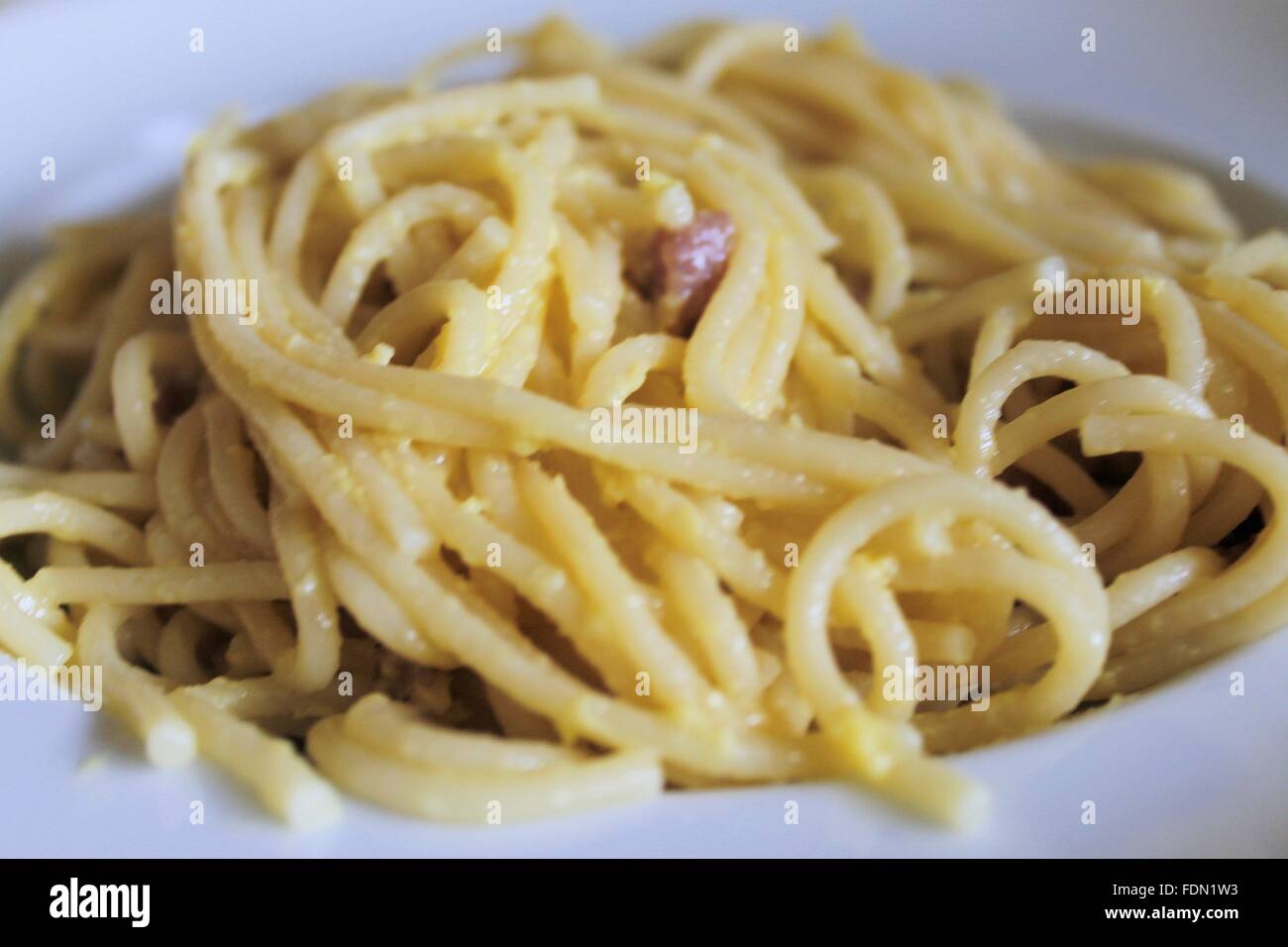 traditional Italian dish, spaghetti pasta called "carbonara" with bacon