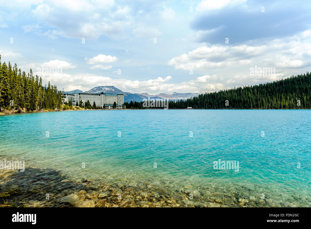 Chateau Lake Louise hotel in Banff, Alberta Canada with Victoria Glacier in background Stock