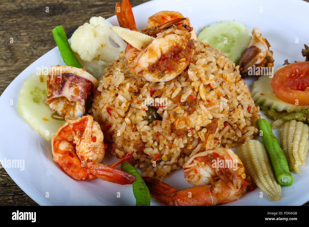 Asian style Fried rice with seafood, herbs and spices Stock Photo - Alamy