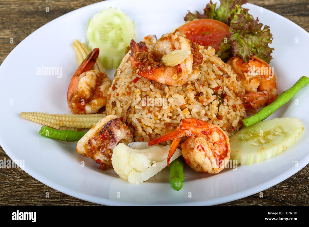 Asian style Fried rice with seafood, herbs and spices Stock Photo - Alamy