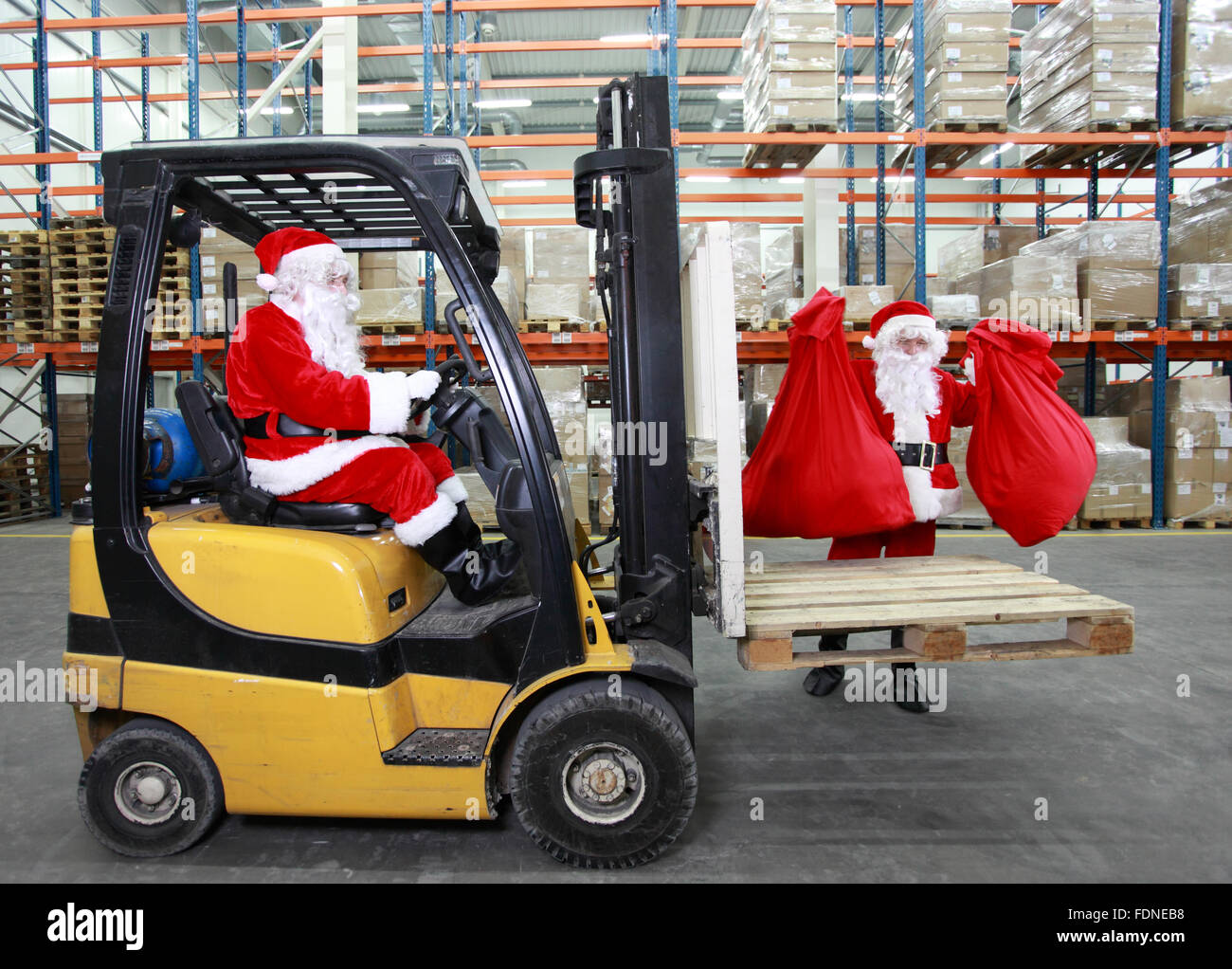 logistics,santa clause,forklift,christmas preparation Stock Photo - Alamy