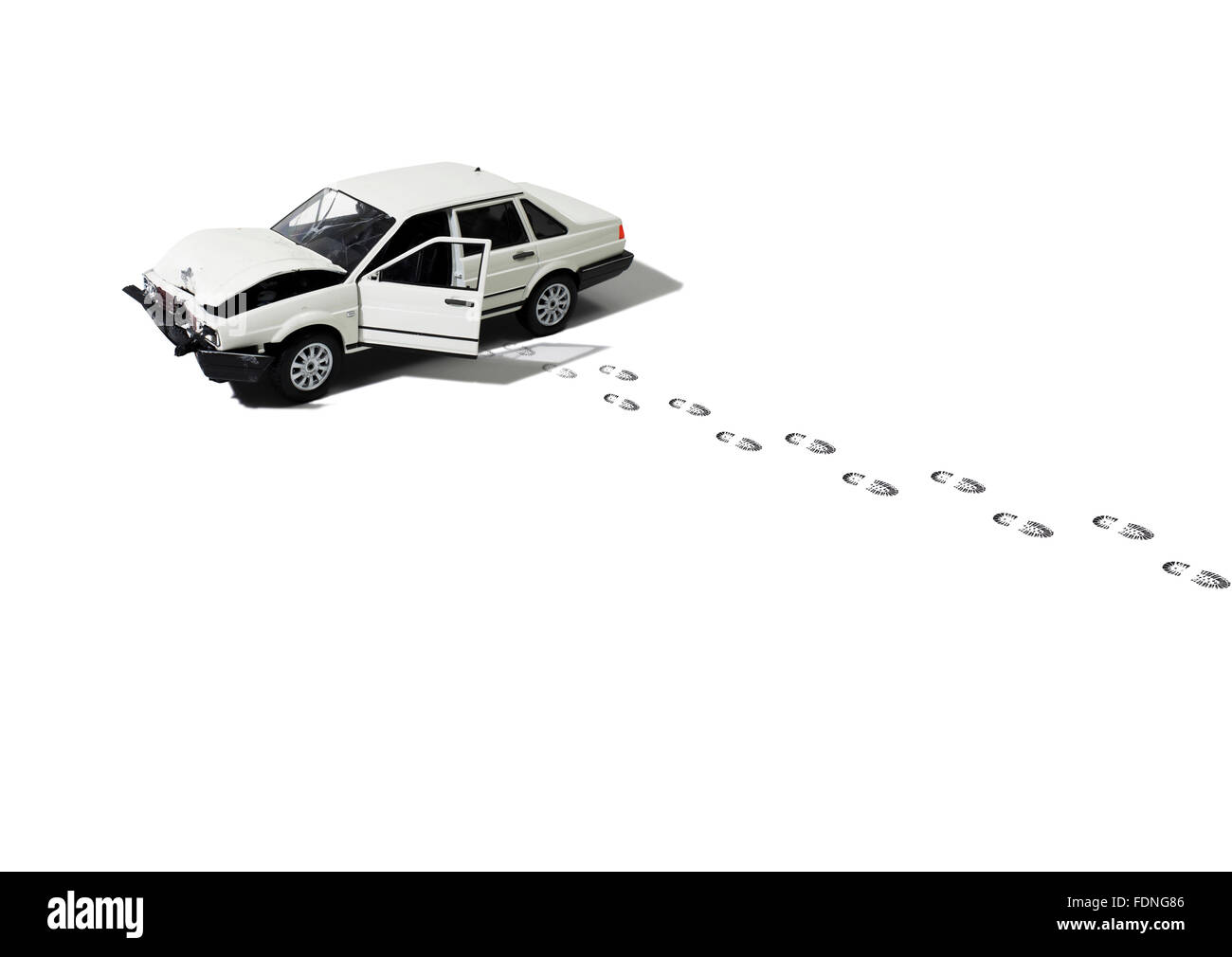 Studio shot of a toy abandoned and wrecked automobile (model) Stock Photo