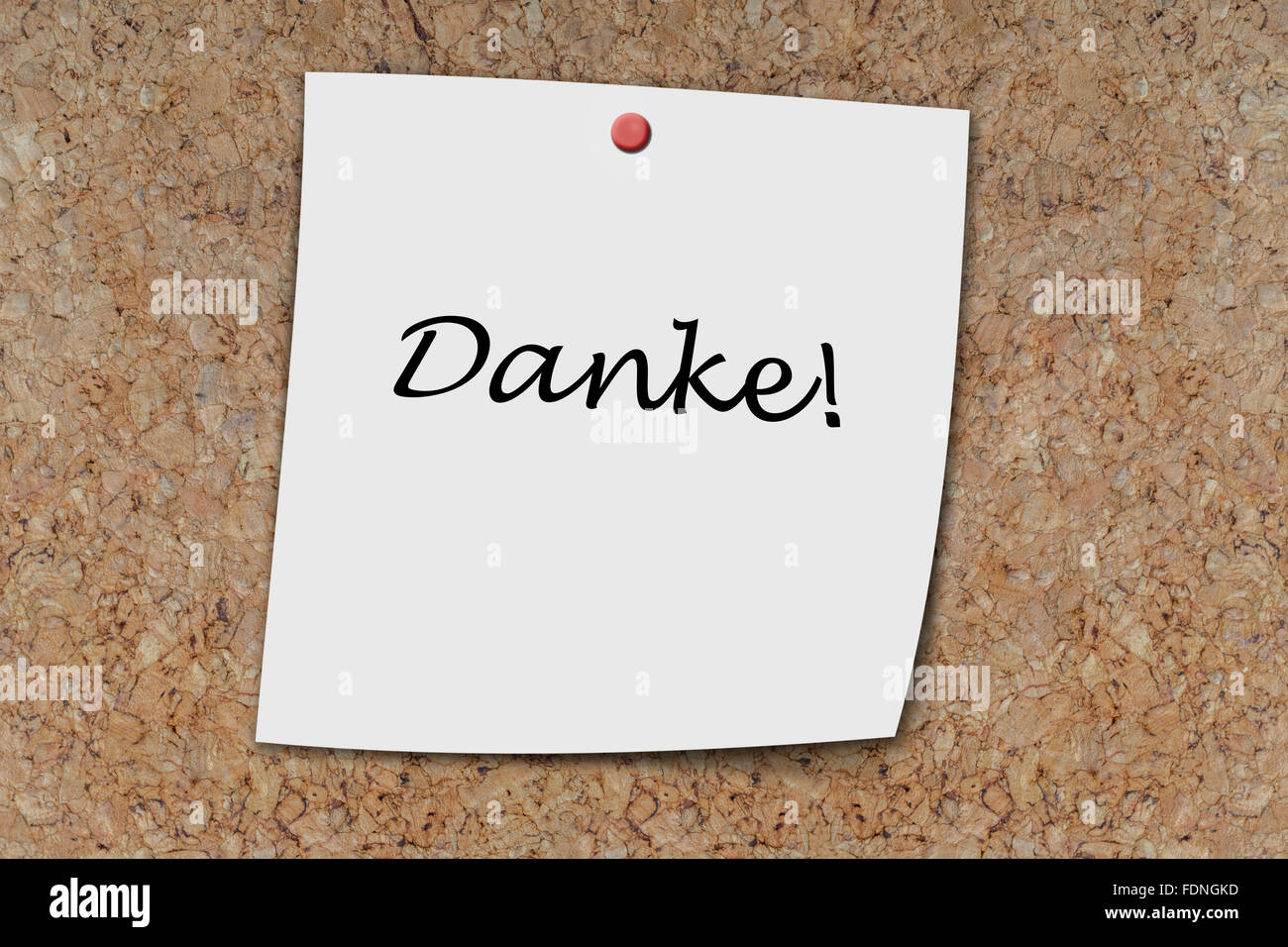 Danke (german Thank you) written on a memo pinned on cork board Stock Photo